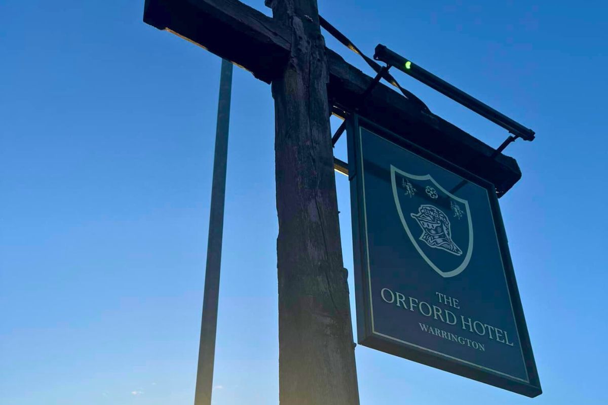 An outdoor sign board of The Orford Hotel Warrington