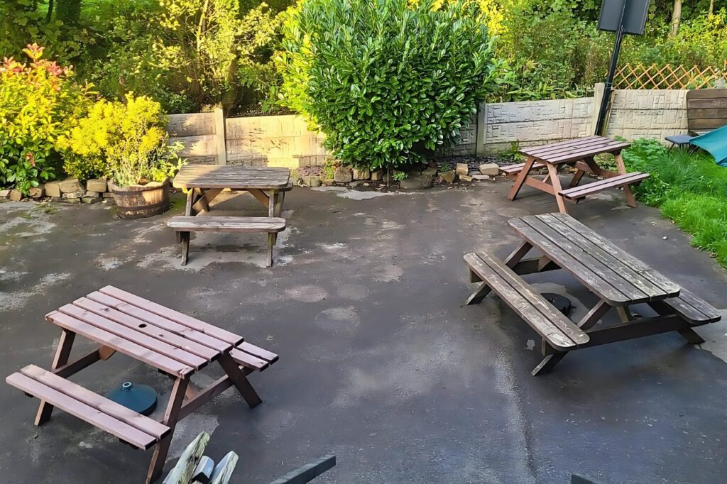 Outdoor beer garden at The Black Horse Pub
