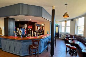 An image of the bar area of The Newmarket Pub used for a blog titled 'onboarding for pubs'.